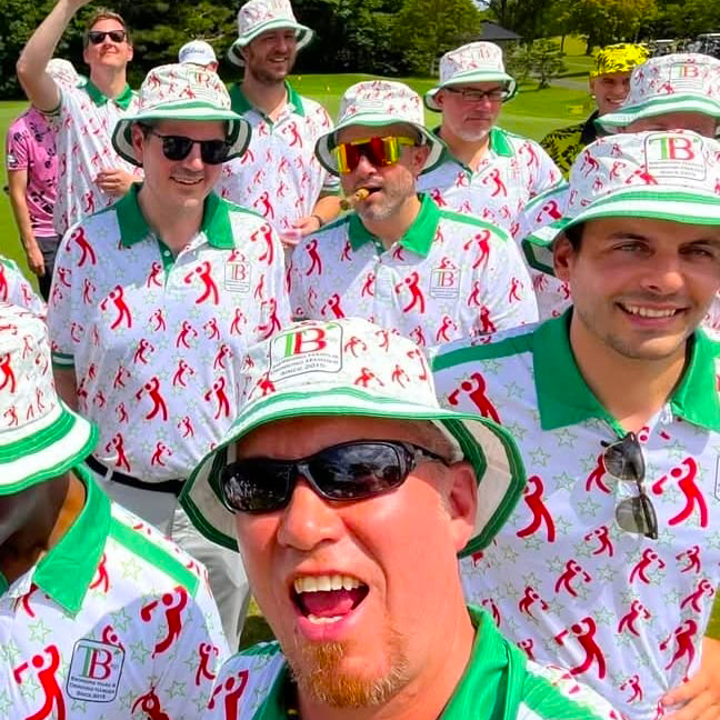 TBags Tokyo Beer and Golf Society members on the course in matching green and red star-print polos and bucket hats