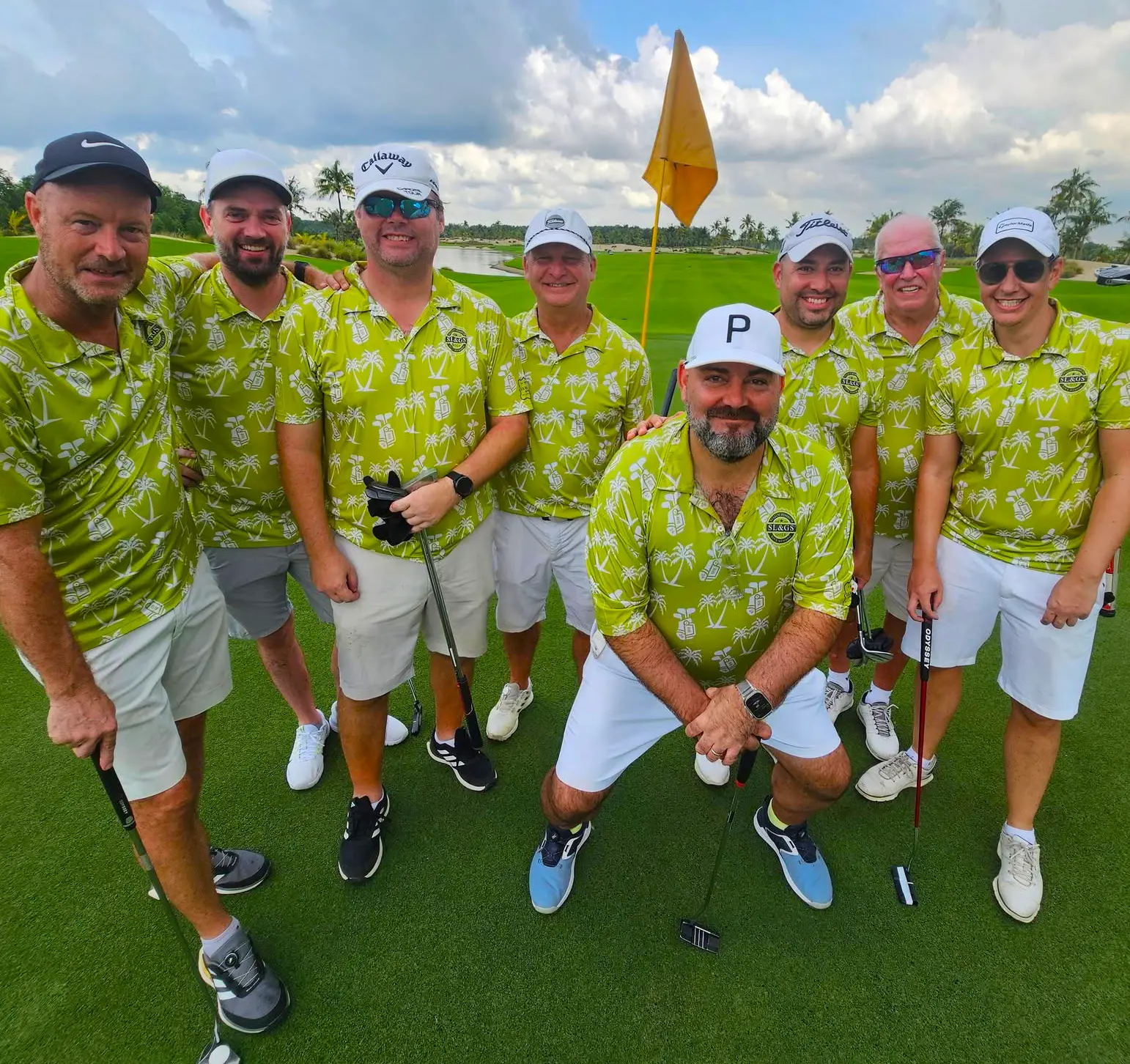 Golfers wearing the 8 Iron polo design