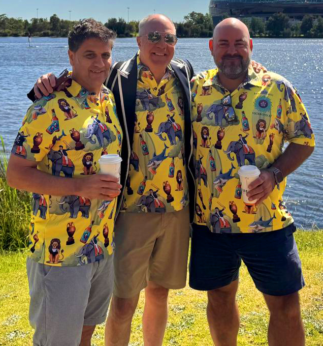 Viceroys XI tourists in matching yellow elephant print polos